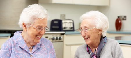 older ladies eating together | living with dementia